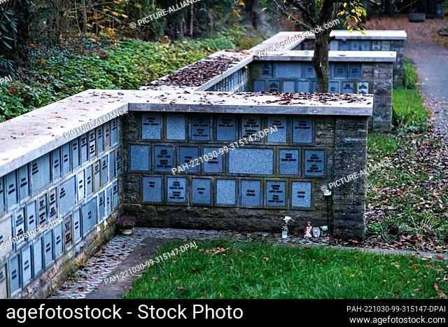 29 October 2022, Bavaria, Nuremberg: A niche wall for urns in the western cemetery. The All Saints' Day holiday and later the Sunday of the dead bring many...