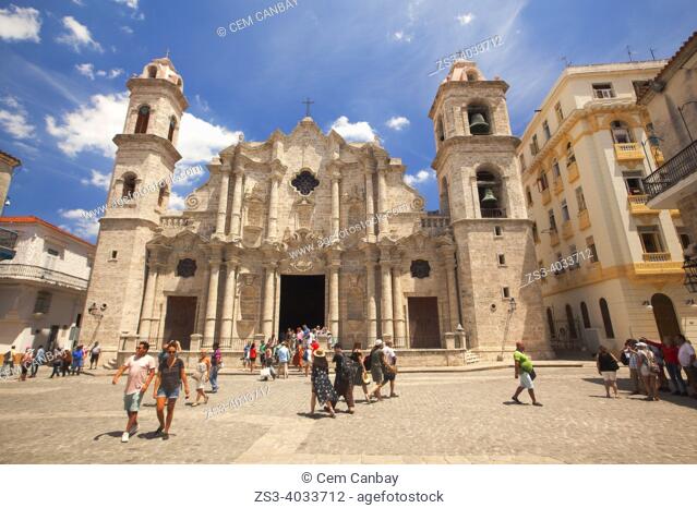 Tourists in front of Cathedral Of Havana-Catedral De La Habana at Plaza Catedral in Habana Vieja-Old Havana, La Habana, Cuba, West Indies, Central America