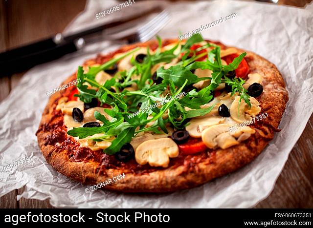 Pizza with Cheese, Tomatoes, Champignon, Olives and Arugola