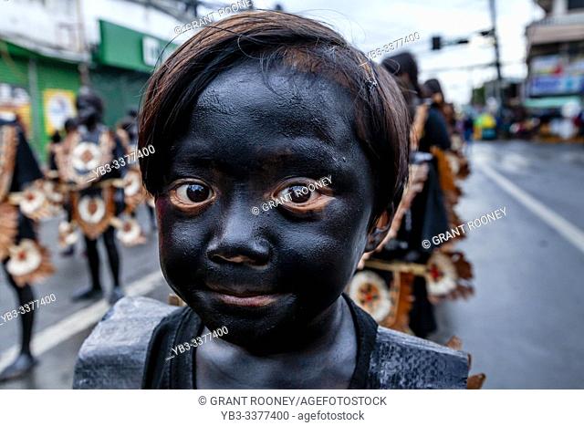 A â. . Blacked Upâ. . Child Takes Part In A Childrenâ. . s Parade During The Ati-Atihan Festival, Kalibo, Panay Island, Aklan Province, Western Visayas
