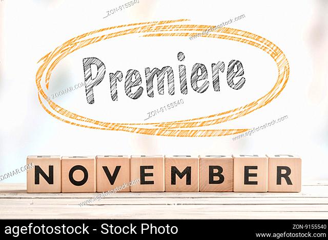 November premiere sign with wooden blocks on a stage