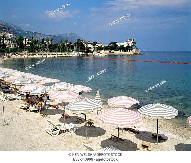 View across beach on Fourmis Bay to Villa Kerylos, Beaulieu-sur-Mer. Alpes-Maritimes, France