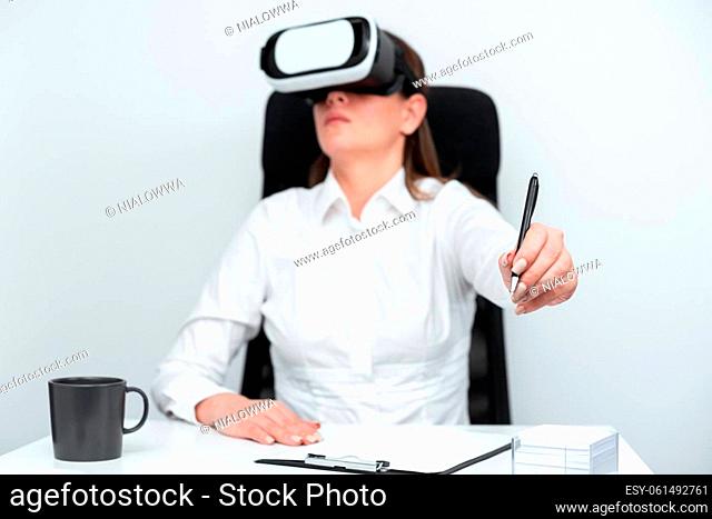 Woman Wearing Goggles And Learning Skill With Virtual Reality Simulator