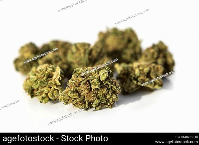 Marijuana pieces on a isolated white background