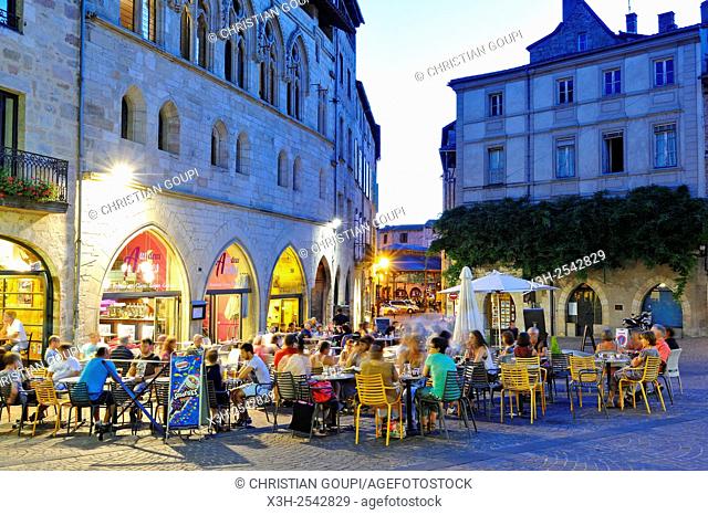 outside restaurant at the foot of the Maison des Templiers Knights Templar's House on Champollion square at dusk, city of Figeac, Lot department