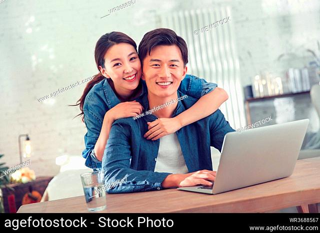 Happy young couples home office