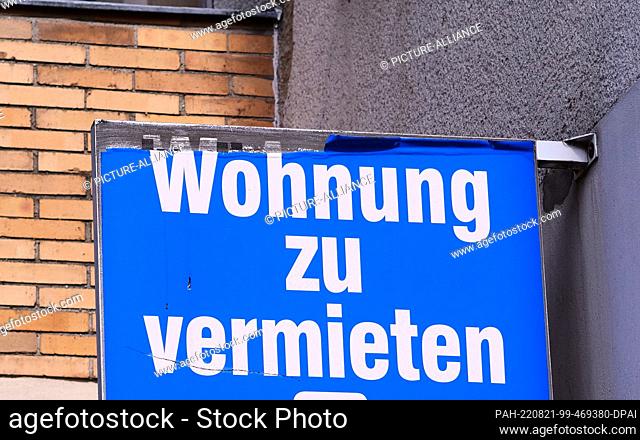 21 August 2022, Berlin: 21.08.2020, Berlin. An old sign reading ""Apartment for rent"" hangs on an apartment building in the Neukoelln district