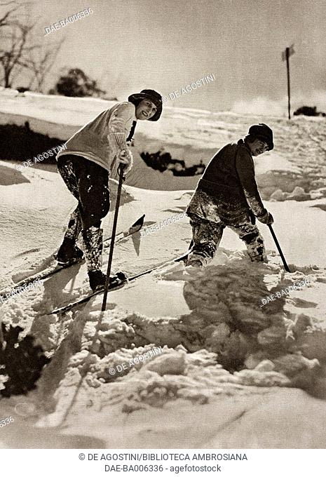 Two skiers in August, Kerry Course, Mount Kosciuszko, New South Wales, Australia, illustration from the weekly magazine The Bystander, Christmas number