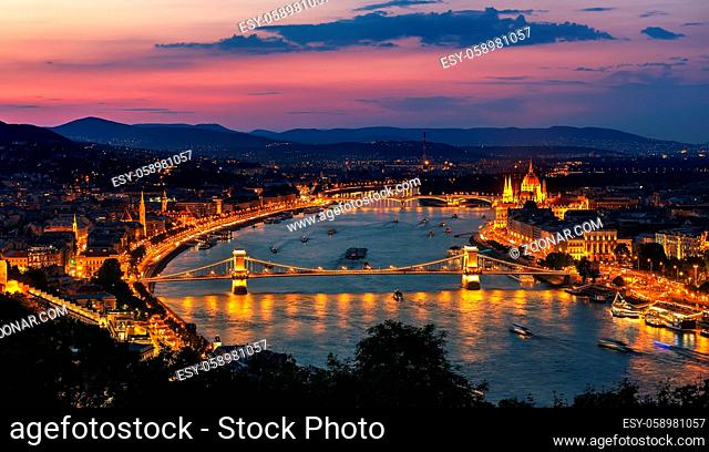 Aerial view of Budapest and illuminated landmarks at sunset