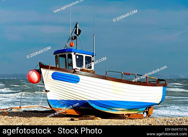 DUNGENESS, KENT/UK - FEBRUARY 3 : Fishing boat on Dungeness beach in Kent on February 3, 2008