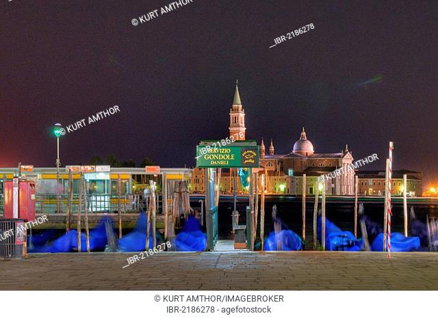 View from Piazza San Marco, St. Mark's Square, over gondolas at night towards the Church of San Giorgio, Canale di San Marco, Venice, Veneto, Italy, Europe