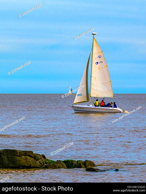 MONTEVIDEO, URUGUAY, MAY - 2019 - Sailboat sailing at river in montevideo coast, uruguay