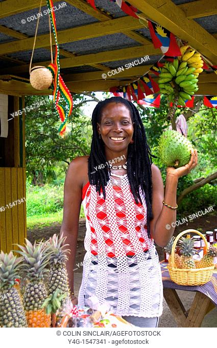 Antigua, Interior rain forest, Fig Tree Drive, natural products stall and proprietor