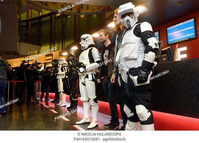 Members of a Star Wars fan club wear costumes to the premiere of the new Star Wars film in Stuttgart, Germany, 17 December 2015