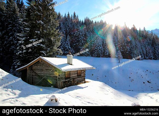 Winter hike near Mittenwald, near Elmau, Klais, Europe, Germany, Bavaria, Upper Bavaria, Werdenfels, winter, mountain hut atmospheric in the backlight