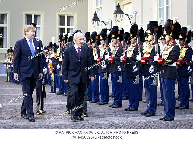 King Willem-Alexander of the Netherlands (L) recieves Israeli president Schimon Peres at Palace Noordeinde during his official visit to the Netherlands in The...
