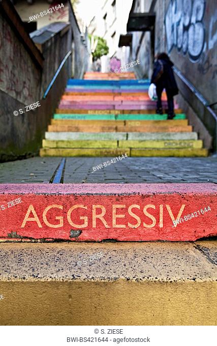 the word 'aggessive' on colourful perron, Scala, Holsteiner Treppe, Germany, North Rhine-Westphalia, Bergisches Land, Wuppertal