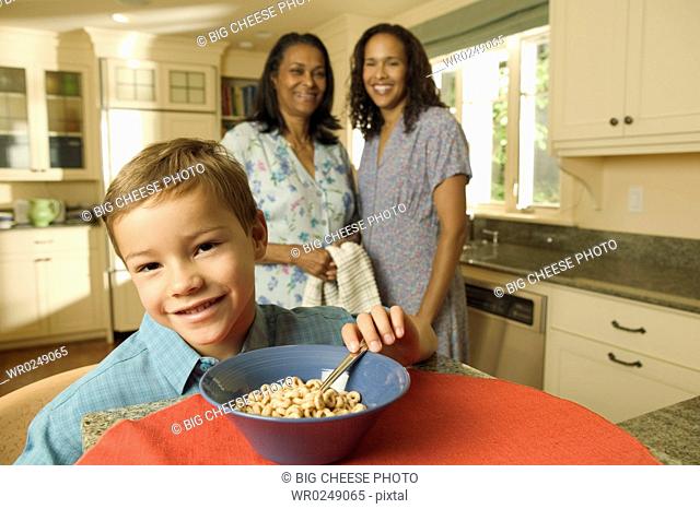 Free Photo  African american mother and son cooking together in the kitchen