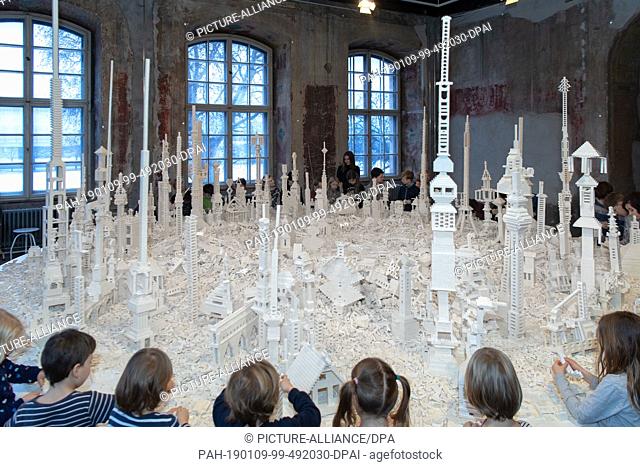 09 January 2019, Saxony, Dresden: During the children's biennial in the Japanese Palais, children will play with the work ""The cubic structural evolution...