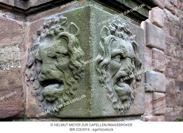Two lion heads, reliefs, at the bottom of a column by the entrance to Christiansportal, built c. 1607, at Hohe Bastei, high bastion, in the courtyard