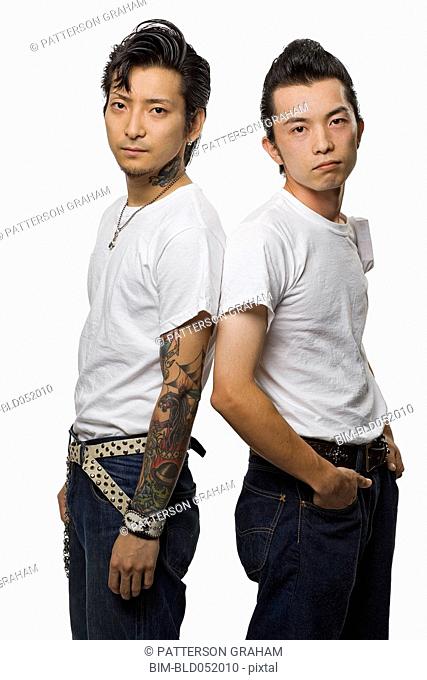 Two Asian men in rockabilly clothing