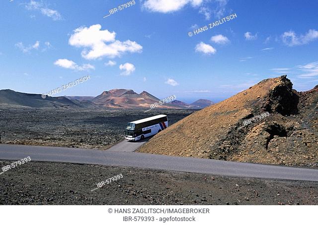 Tour bus in the National park Timanfaya, Lanzarote, Canary Islands, Spain