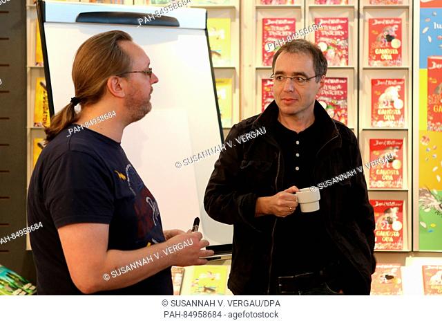 Comic artist Oliver Kurth and author David Safier at the Frankfurt Book Fair in Frankfurt/Main, Germany, 20 October 2016. PHOTO: SUSANNAH V