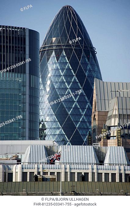 Office skyscraper in financial district of city, Swiss Re Tower ('The 'Gherkin'), City of London, London, England, april