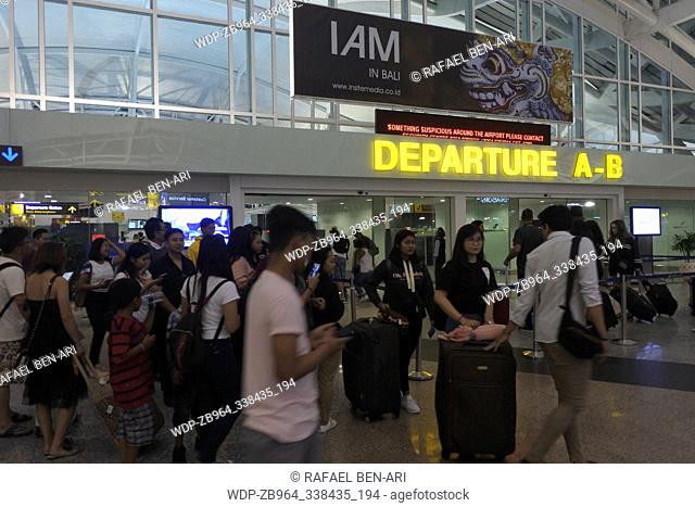 BALI - AUG 08 2019:Air passengers at Ngurah Rai International Airport Bali Indonesia, world's third best airport (with 15-25 million passengers each year)
