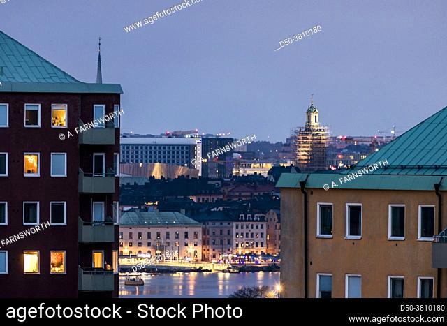 Stockholm, Sweden A view of the Stockholm harbor and some residential buildings at night