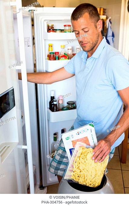 Man checking the composition and nutrition facts