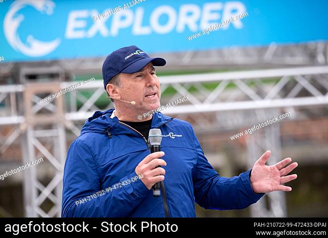 21 July 2021, Hamburg: Jan Jenisch, CEO of Holcim, speaks before the christening of the ""Circular Explorer"". The environmental organization ""One Earth - One...