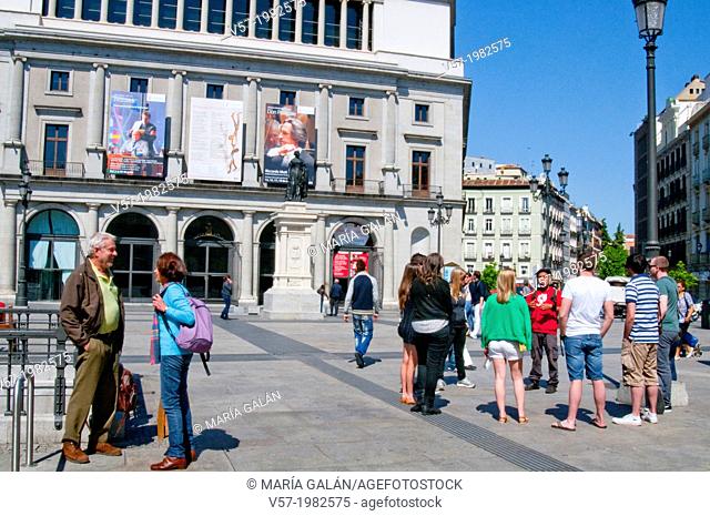 Group of tourists at Isabel II Square. Madrid, Spain