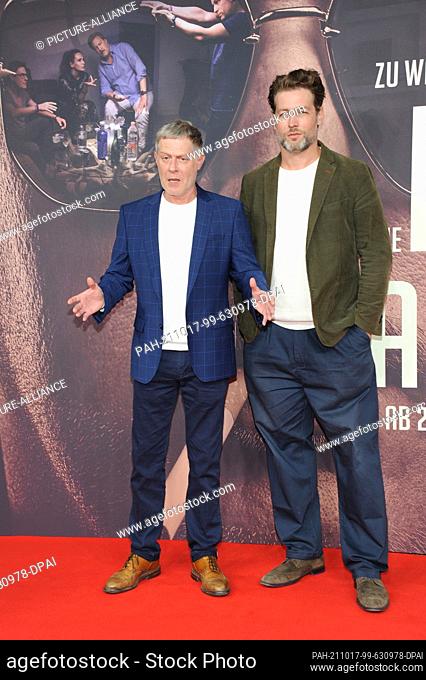 17 October 2021, Bavaria, Munich: Actors Andreas Lust (l) and Julian Looman arrive for the German premiere of the Sky series ""The Ibiza Affair"" at the Astor...