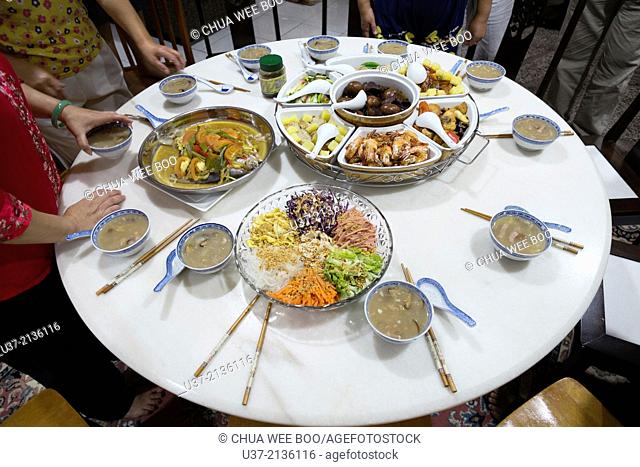 A typical Chinese New Year Eve family gathering dinner in Kuching, Sarawak, Malaysia