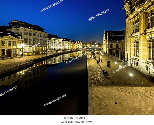 Belgium, Ghent, promenade at Graslei and Korenlei with historical houses in the evening