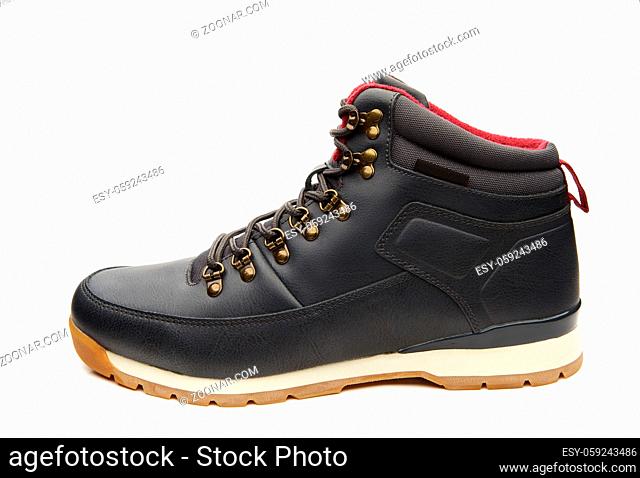 Close up view of a modern black man boot isolated on a white background
