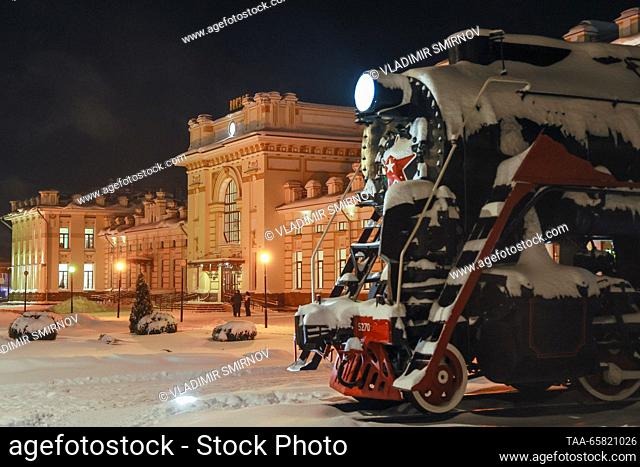 RUSSIA, YAROSLAVL REGION - DECEMBER 15, 2023: An L-5270 retro steam locomotive is seen at a train station in the town of Rybinsk