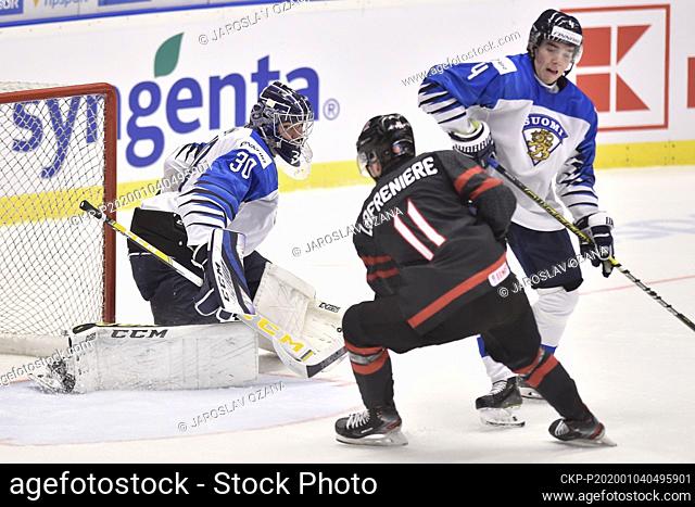 L-R JUSTUS ANNUNEN of Finland, ALEXIS LAFRENIEREM of Canada, VILLE HEINOLA of Finland in action during the 2020 IIHF World Junior Ice Hockey Championships...