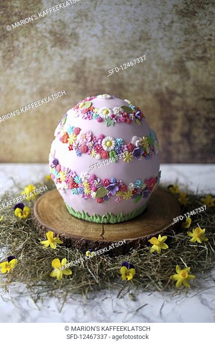An Easter egg cake made with Baileys, chocolate and blackberries