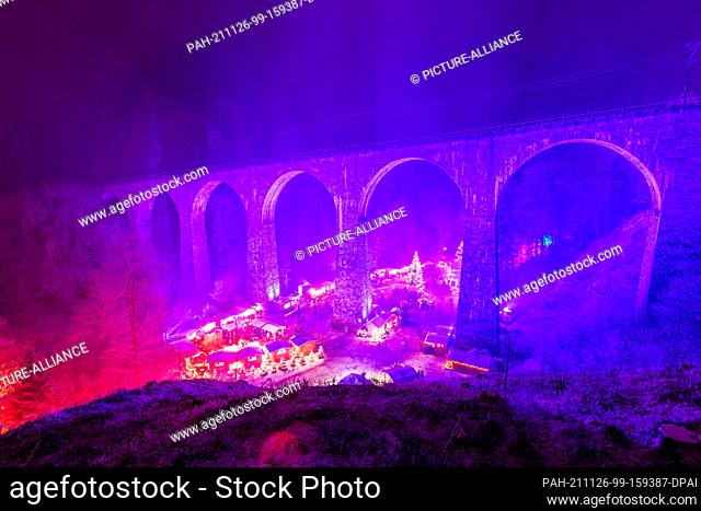 26 November 2021, Baden-Wuerttemberg, Breitnau: View of the stalls at the Ravenna Gorge Christmas Market, which takes place under an aqueduct
