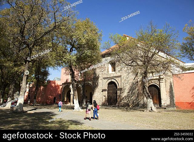 People in front of the Franciscan Ex Convent Cathedral Of The Virgin Of The Assumption or Ex Convento Franciscano Catedral De La Virgen De La Asuncion in the...