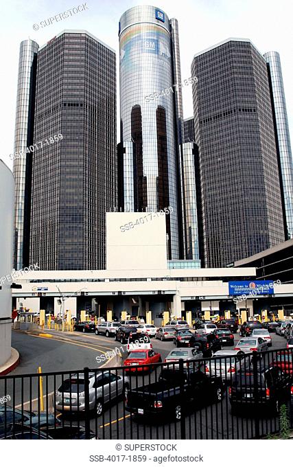 Toll Plaza to Enter Tunnel to Windsor Candada in downtown Detroit with the GM Headquarters Building towering over in the Background