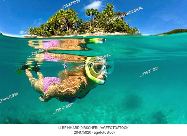 Woman snorkeling in Palau, Micronesia, Palau