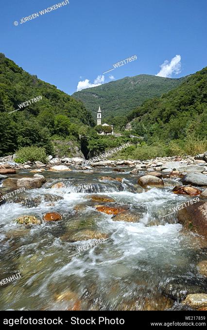 Cannobino river and Saint Anna church in the background, Cannobio, Piedmont, Italy, Europe | Cannobino river near Cannobio and Saint Anna church in the...