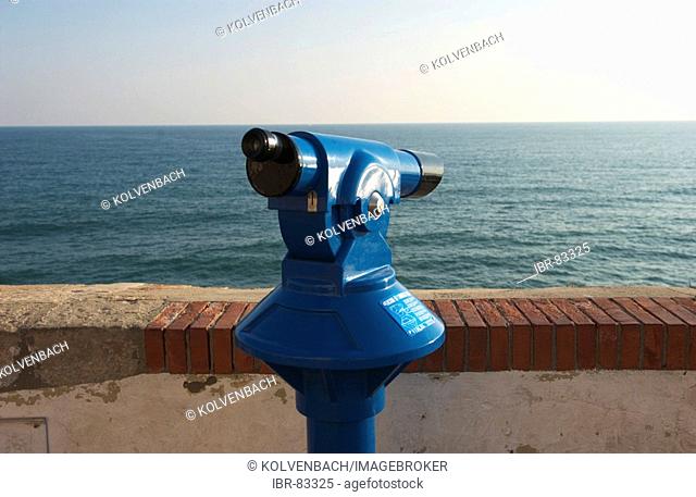Blue telescope points out to sea