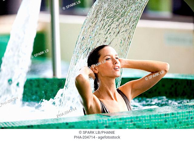 Woman in spa pool