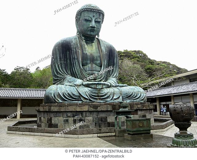View of the bronze statue of Amitabha Buddha from the 13th century at the Kotoku-in temple in Kamakura, Japan, 24 April 2013