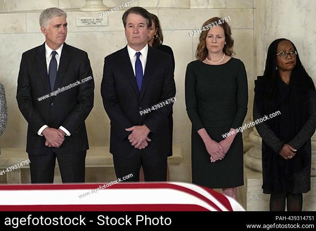 From left to right: Associate Justices of the Supreme Court Neil M. Gorsuch, Brett Kavanaugh, Amy Coney Barrett, and Ketanji Brown Jackson listen during a...