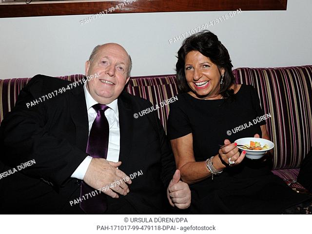 Babette Albrecht, ALDI widow, smiles with former soccer official Reiner Calmund during the 20th Busche Gala at the ""Rocco Forte"", the Charles Hotel in Munich